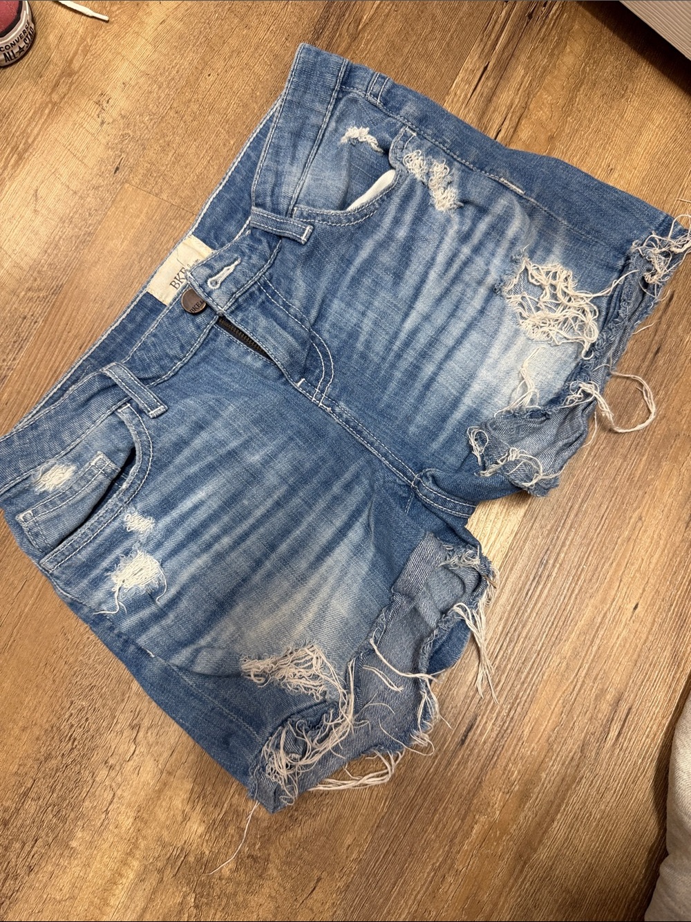 BKE Distressed Frayed Hem Jean Shorts in Medium Blue